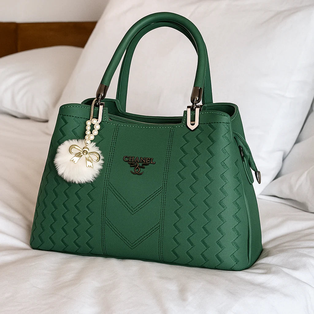 Elegant Green Designer Handbag with Chic Charm Accessory