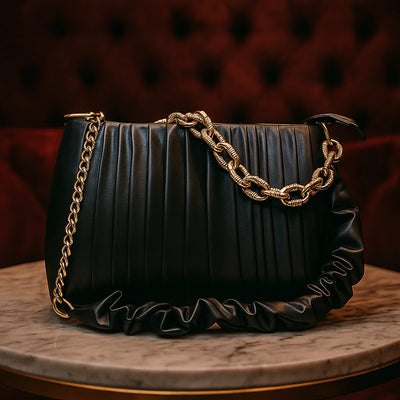 Luxury Black Handbag with Gold Chain Detailing